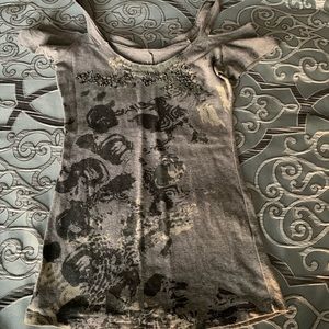 Off the shoulder short sleeve shirt.